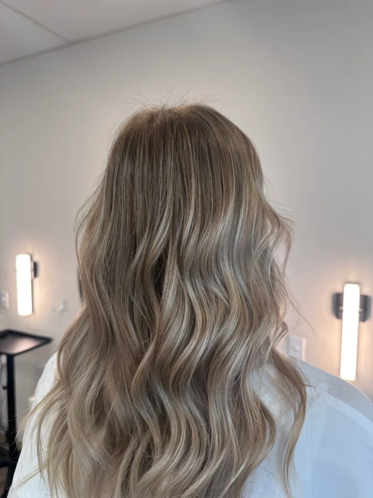 Soft blonde babylights with blended dimension and waves