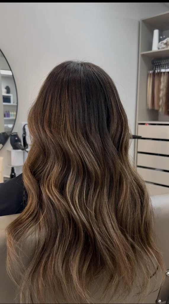 Soft brunette balayage with blended caramel highlights