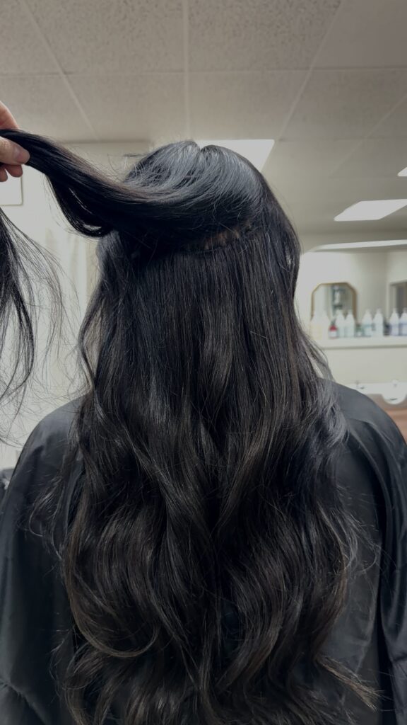 Hair extensions installation showing natural blend and added length at Anna Hair Studio in Lake Oswego