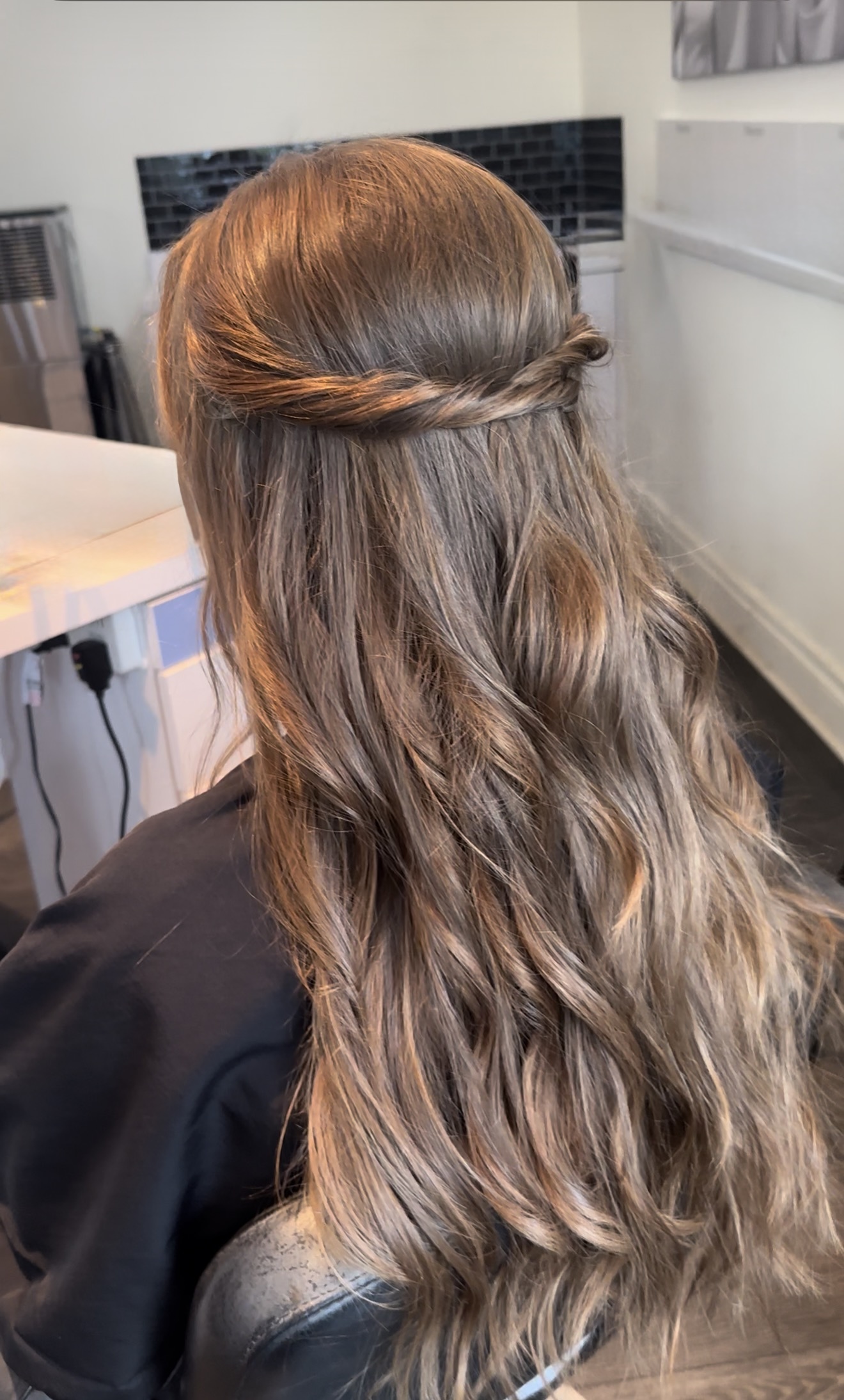 client with special occasion style braid
