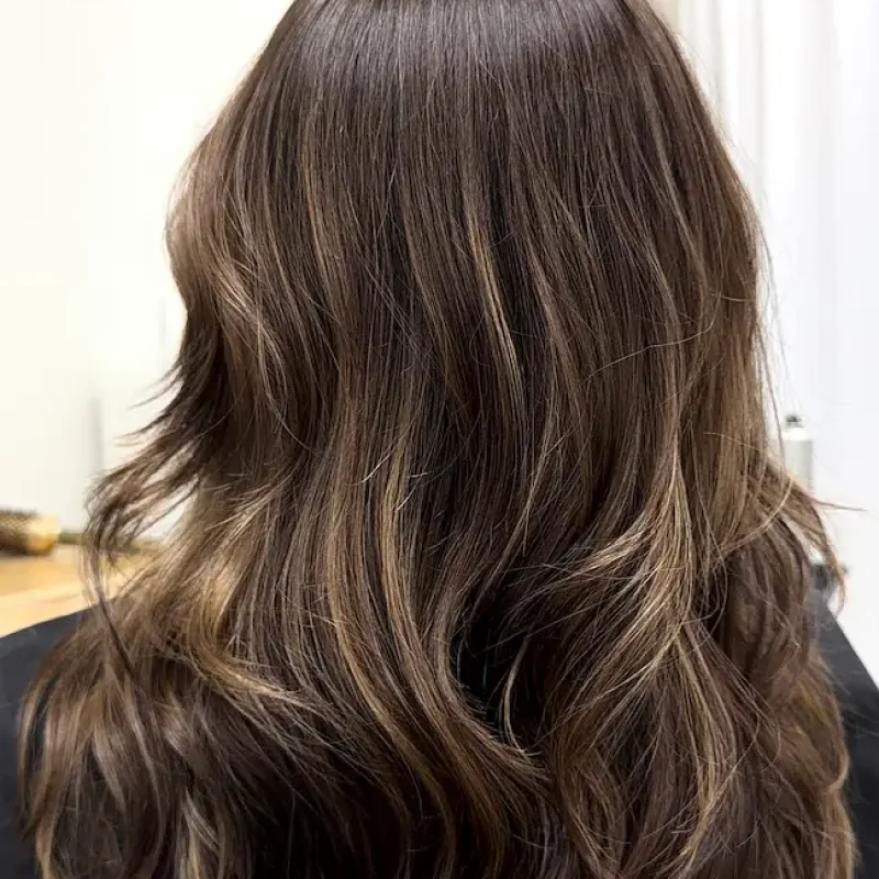 Brunette balayage with soft caramel dimension